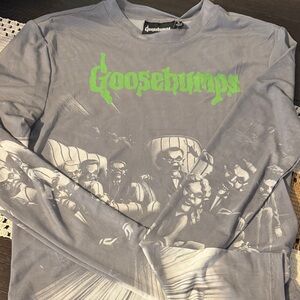 Goosebumps Women's Long Sleeve Graphic Tee in Gray with Green Logo